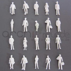100 niepomalowanych białych figurek modelowych – skala 1:100, modelarstwo kolejowe TT, zestaw figurek architektonicznych i budowlanych