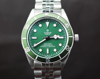 Refurbished Automatic Tudor Chronometer In Green Dial Men's Watch With Rotating Bezel.
