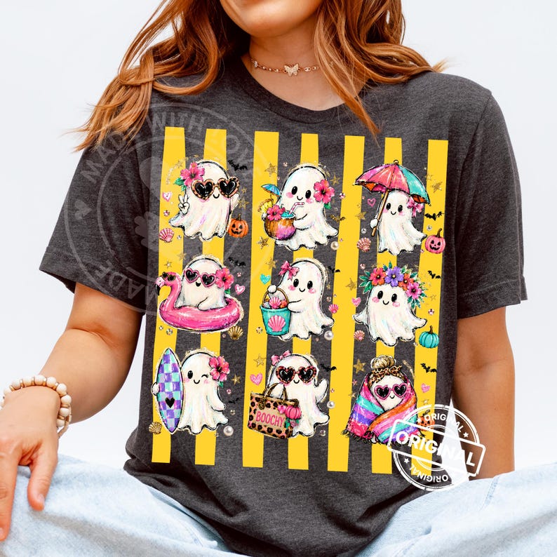 May include: A dark grey t-shirt featuring a graphic print of nine white ghosts in various summer activities, including holding a drink, an umbrella, a surfboard, and a bag labelled BOOCHY, set against a background of vertical yellow stripes.