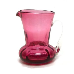 Vintage Pilgrim Cranberry Glass Creamer – Hand-Blown Mini Pitcher with Applied Clear Handle – 4-Inch Melon Base