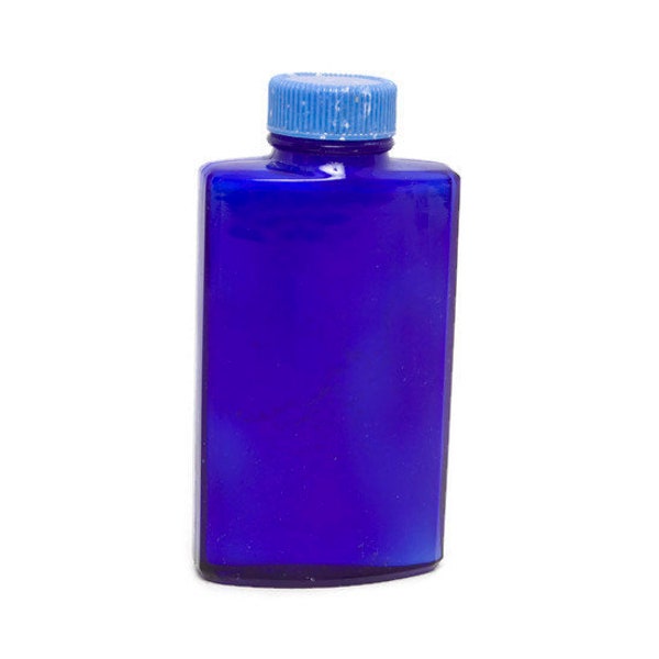 vintage BOURJOIS bouteille en verre bleu cobalt poudre de talcom du soir à Paris Décoration de toilette pour le bain et la beauté