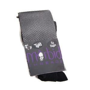 May include: A white ceramic mug with a black handle and the text "But First, Coffee" in a black, handwritten-style font. The mug is on a white surface.