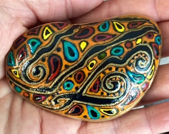 Paisley River / painted stone / orange / Aztec / fiesta / Sandi Pike Foundas / from the sea / Cape Cod