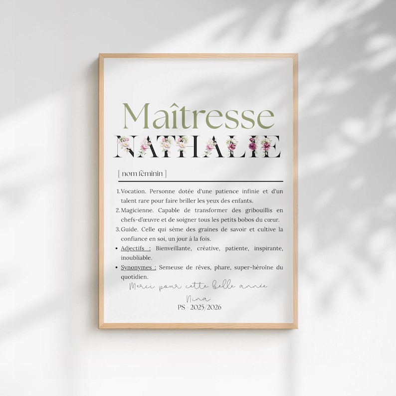 May include: A framed print with the word "Ma&icirc;tresse" in a green font, and the name "Nathalie" in a black font with floral accents. The print includes a definition and adjectives in French, with a handwritten note at the bottom.