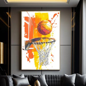 Könnte beinhalten: Ein rechteckiger Wandkunstdruck, der einen stilisierten Basketball über einem Korb und Netz zeigt. Das Kunstwerk verwendet leuchtende orangefarbene und gelbe Farbspritzer sowie skizzenhafte schwarze Linien auf weißem Grund für die Szene.