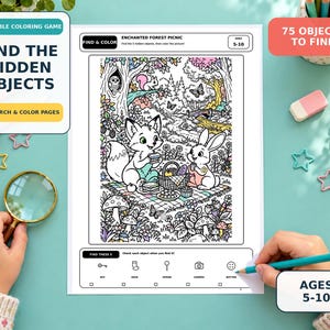 May include: A printable coloring game sheet titled Enchanted Forest Picnic featuring a black and white line art illustration of a fox and rabbit having a picnic. The page includes a Find and Color section with icons for a key, sock, spoon, camera, and button.