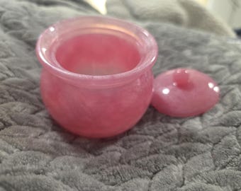 Frasco rosa y blanco