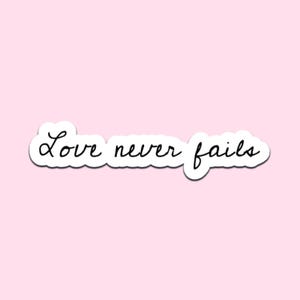 Love Never Fails Cursive Sticker | Inspirational Waterproof Gloss Vinyl Decal