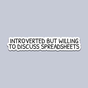 May include: A white sticker with black text that reads "INTROVERTED BUT WILLING TO DISCUSS SPREADSHEETS." The sticker has a rounded rectangle shape and is set against a light gray background.