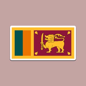 May include: A sticker depicting the Sri Lankan flag. It has a yellow border, a maroon background with a golden lion holding a sword, and vertical green and orange stripes on the left.