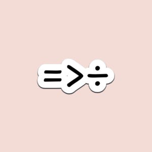 May include: A white sticker with black mathematical symbols. The sticker shows an equals sign, a greater than sign, and a division symbol. The background is a pale pink colour.