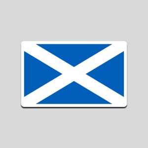 May include: A rectangular sticker displaying the Scottish flag. The flag consists of a white saltire (diagonal cross) set against a blue backdrop. The sticker has a rectangular shape with rounded corners.