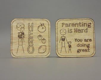 Parenting is Hard half dollar sized wooden coin. 20 coins