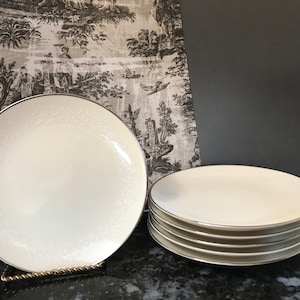 Noritake Ivory China, Six Bread and Butter Plates and One Fruit Cup