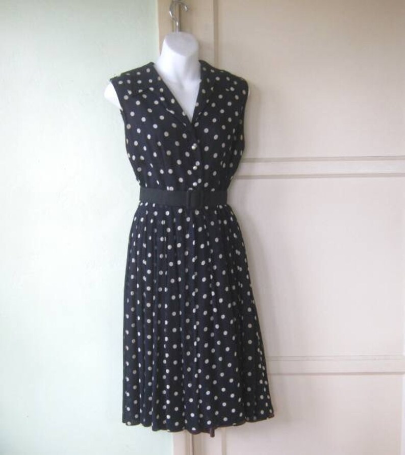 navy blue dress with white polka dots