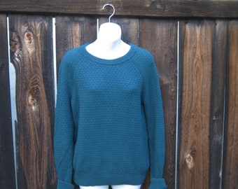 teal sweatshirt