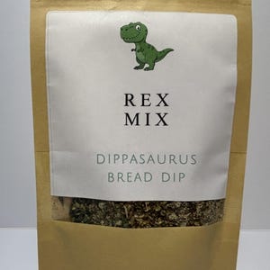 May include: A set of three ceramic mugs with a speckled, matte finish. The mugs are in shades of cream, light gray, and dark gray. Each mug has a simple, minimalist design, perfect for coffee or tea.