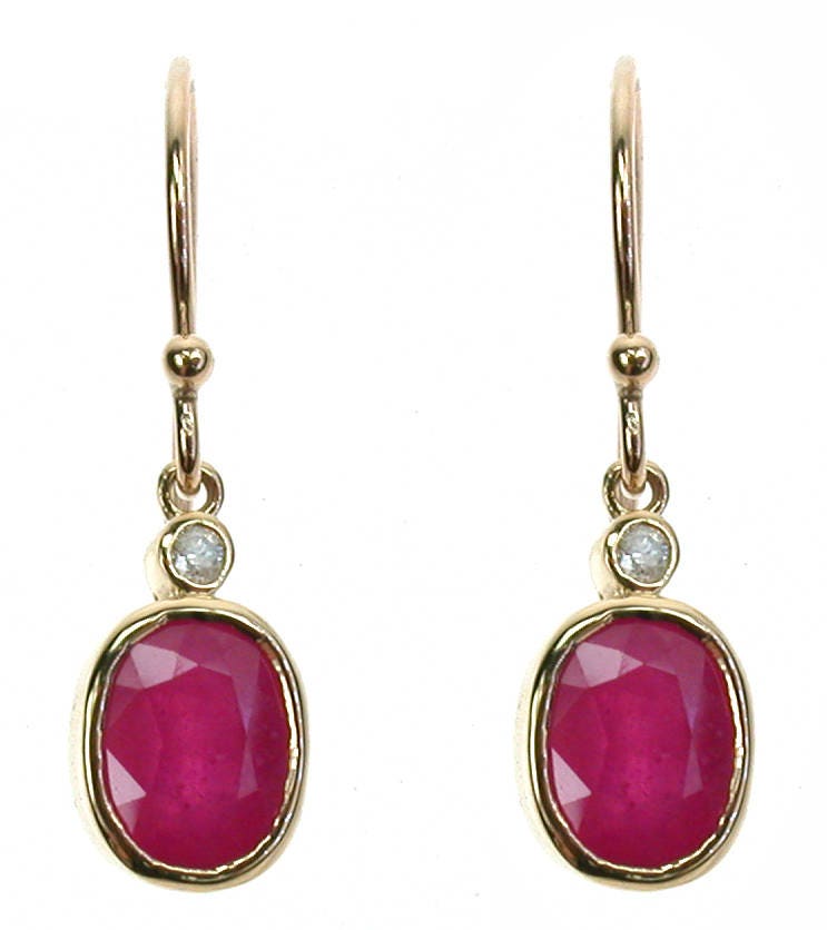 Floral platinum, cz and ruby pink studs with pearl drop -