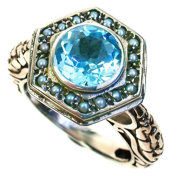 Blue topaz and store pearl ring