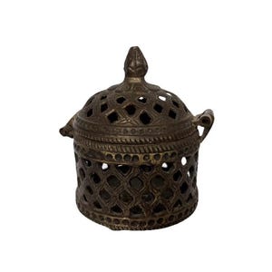 May include: A set of three ceramic mugs with a speckled, matte finish. The mugs are in shades of cream, light gray, and dark gray. Each mug has a simple, minimalist design, perfect for coffee or tea.