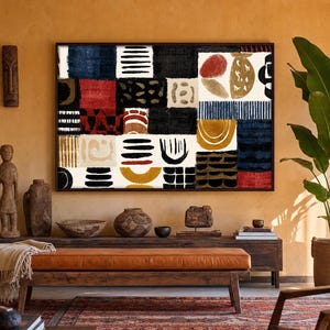 May include: A large rectangular wall art piece featuring a grid of abstract geometric shapes and patterns in black, white, red, and ochre. The composition includes various hand-drawn style lines, circles, and organic forms arranged in a block layout.