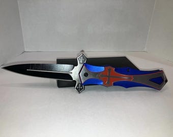 Spring Assistant Stiletto Style knife 9" Approx. Christian Blue Handle With Cross