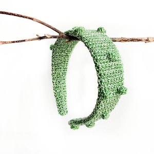 Green bubbles headband crocheted of a very singular thread. Woman gifts handmade in Spain