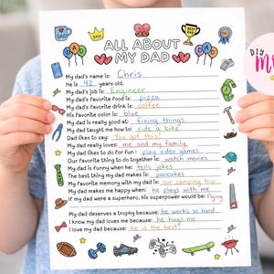 May include: A white paper questionnaire titled All About My Dad with colorful hand-drawn illustrations of icons like trophies, tools, and sports gear. The form contains handwritten answers in blue and black ink about a father named Chris.