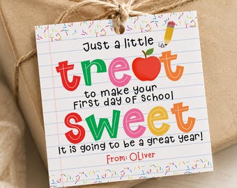 May include: A square gift tag with a white background featuring lined paper patterns and colorful sprinkles. The text reads: Just a little treat to make your First day of School SWEET. It is going to be a great year! From: Oliver. Includes a red apple and pencil icon.