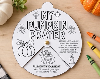 May include: A circular white paper craft with black outlines featuring the text MY PUMPKIN PRAYER, a pumpkin, praying hands, and a candle. It includes the verse Matthew 5:16 and the text FILL ME WITH YOUR LIGHT. A gold fastener holds a rotating piece.