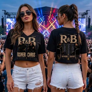 May include: A black cropped t-shirt featuring a gold glitter graphic that reads R&B THE TOUR with images of Usher and Chris Brown. The back of the shirt displays the same graphic with a list of tour dates. The shirt is paired with white denim shorts.
