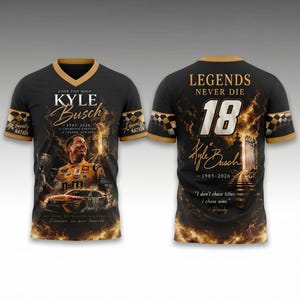 May include: Black and gold v-neck t-shirt featuring a portrait of Kyle Busch, the number 18, and the text "LEGENDS NEVER DIE." The shirt includes the text "GONE TOO SOON" and "Forever in our hearts."