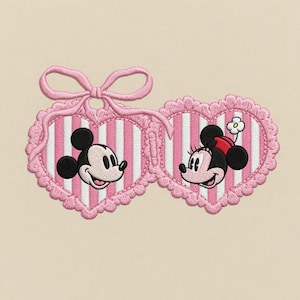 May include: An embroidered patch featuring two heart-shaped frames with pink and white vertical stripes. The left heart contains a Mickey Mouse head, and the right heart contains a Minnie Mouse head with a flower. A pink bow connects the two hearts.