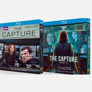 May include: Two Blu-ray box sets of the TV series "The Capture". The first box set is for seasons 1-2, and the second is for season 3. Both feature images of the show's cast and the title in large white letters.