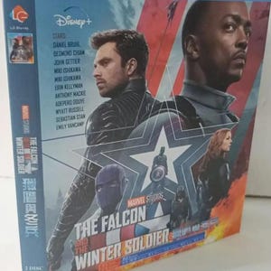 May include: Blu-ray disc of "The Falcon and the Winter Soldier" featuring Anthony Mackie and Sebastian Stan. The cover art includes character portraits and the Disney+ logo. The disc is labeled as 2-disc and 1080.