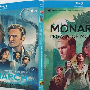 May include: Two Blu-ray disc cases for the TV series "Monarch: Legacy of Monsters." The covers feature images of the cast, including Kurt and Wyatt Russell. The title is prominently displayed, along with the Apple TV+ logo.