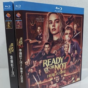 May include: Two Blu-ray movie cases for "Ready or Not 2: Here I Come". The cases feature a movie poster with a woman in the center and the text "Ready or Not" and "Here I Come". The cases are black with blue tops.
