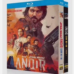 May include: Blu-ray box set for the Star Wars series "Andor". The cover features a group of characters with a man holding a blaster. The title "Andor" is prominently displayed in large letters. The box set includes 2 discs and is in 1080p.