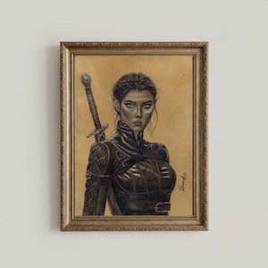May include: Pencil drawing of a woman with pointed ears, a sword, and wearing a black leather-like outfit. The artwork is framed in a gold-colored ornate frame. The background is a tan color.