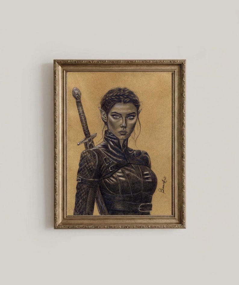 May include: Pencil drawing of a woman with pointed ears, a sword, and wearing a black leather-like outfit. The artwork is framed in a gold-colored ornate frame. The background is a tan color.