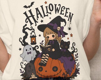 Halloween Witch Sitting on Pumpkin T-Shirt | Spooky Autumn Graphic Tee