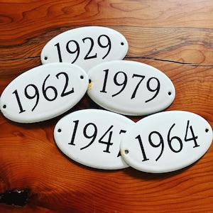 Vintage enamel room numbers. Brocante.