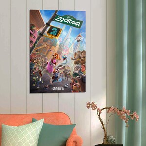 May include: A colorful movie poster for "Zootopia 2" featuring a bustling city scene with various animal characters. The poster includes the text "ONLY IN THEATERS NOVEMBER 26" and the Disney logo.