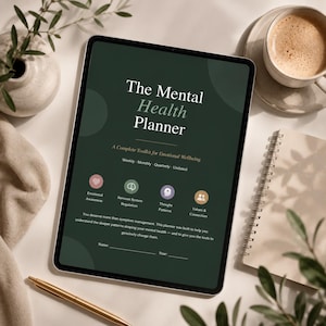 May include: A digital tablet displaying a dark green cover titled The Mental Health Planner: A Complete Toolkit for Emotional Wellbeing. The screen features four circular icons for Emotional Awareness, Nervous System Regulation, Thought Patterns, and Values & Connection, with space for a name and year.