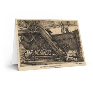 May include: Greeting card featuring a sepia-toned illustration of "THE FEDERAL" threshing machine. The machine is depicted with intricate details, including wheels, gears, and a long conveyor. Text at the bottom reads "THE FEDERAL" THRESHING MACHINE Victoria, 1874.