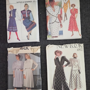 May include: Four sewing patterns for women's clothing. The patterns are from Butterick and New Look. The patterns feature different styles of dresses, skirts, and jackets. The patterns are printed on white paper with black and white illustrations.
