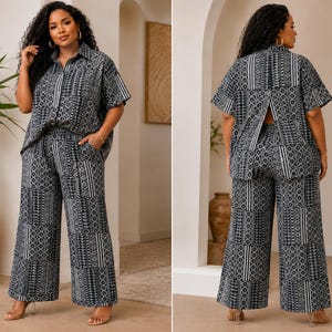 May include: A two-piece set consisting of a short-sleeved button-down shirt and wide-leg trousers, both featuring a black and white geometric patchwork pattern. The shirt has a collar and a split back design, while the pants have side pockets.