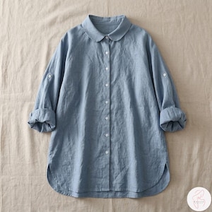 Puede incluir: Un juego de tres tazas de cerámica con un acabado moteado y mate. Las tazas son en tonos crema, gris claro y gris oscuro. Cada taza tiene un diseño simple y minimalista y un asa redondeada.