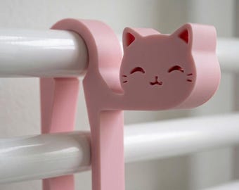 Niedlicher Handtuchhaken in Katzenform für den Badezimmerheizkörper