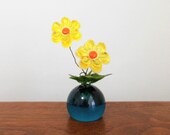 Lucite Design Gifts Flower Arrangement Yellow and Orange Daisies with Green Plastic Leaves in Blue Base Small Two Flower Retro 1970s Decor